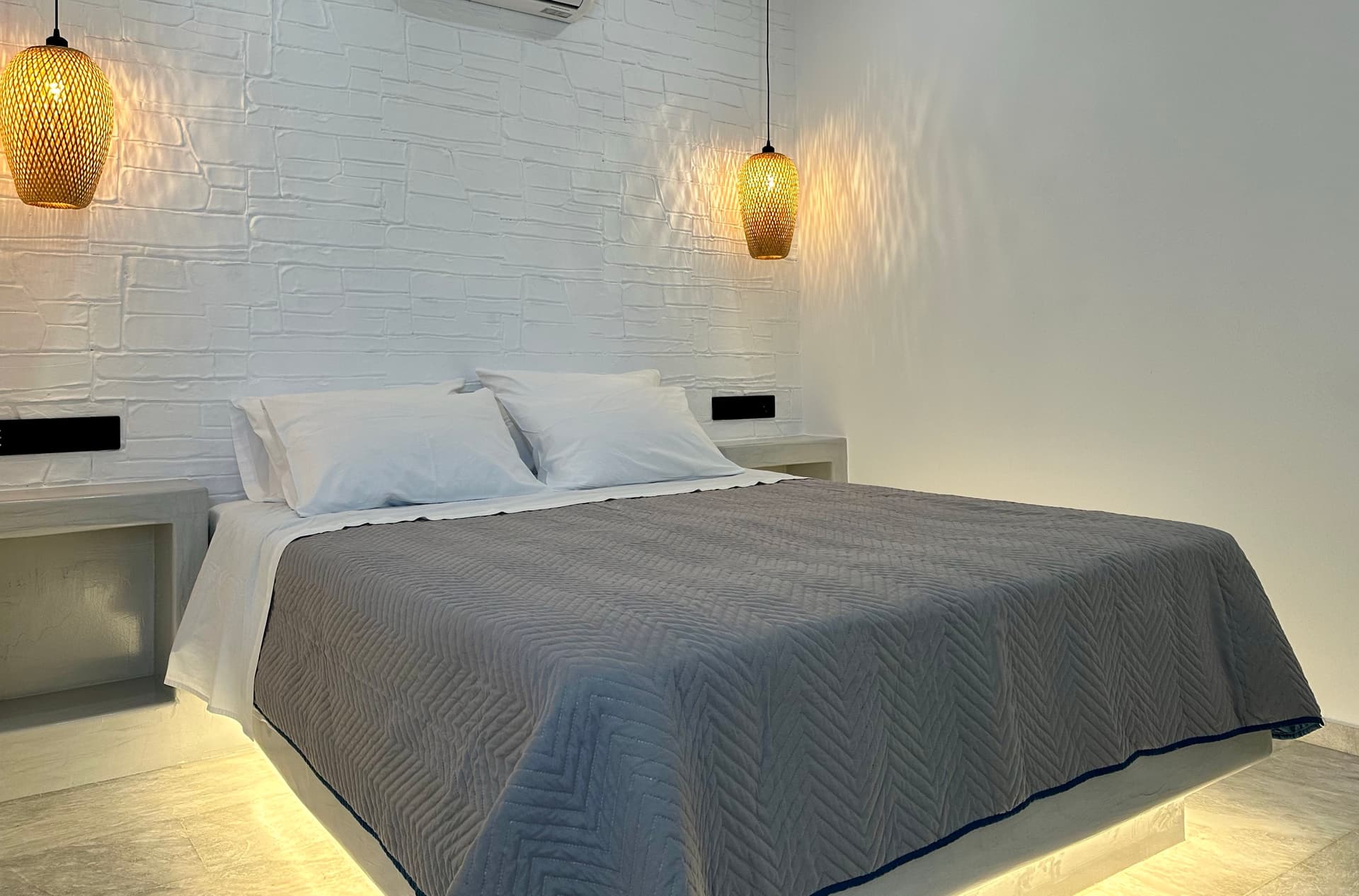 Standard Room interior with double bed - View 1