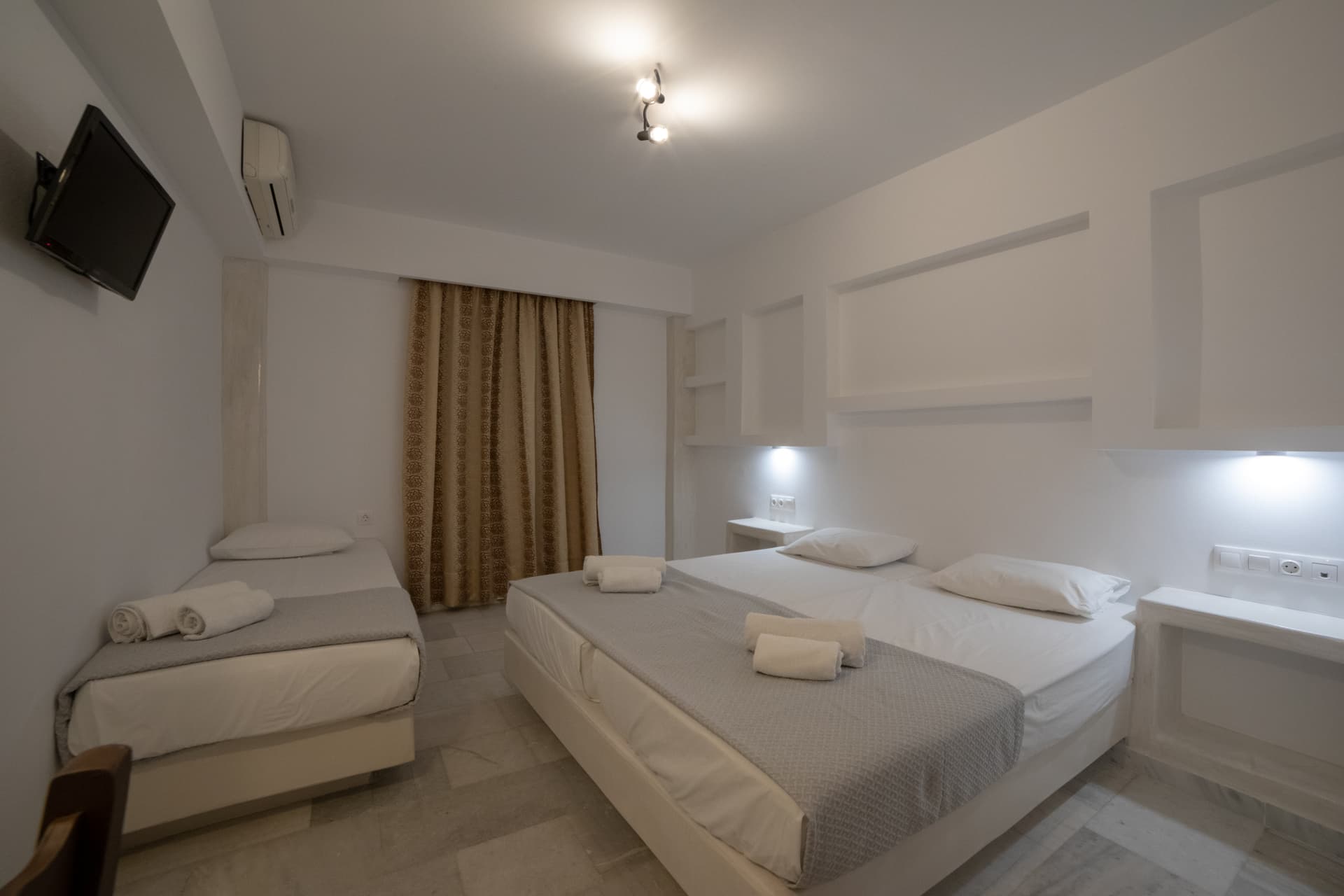 Standard Room interior with double bed - View 7